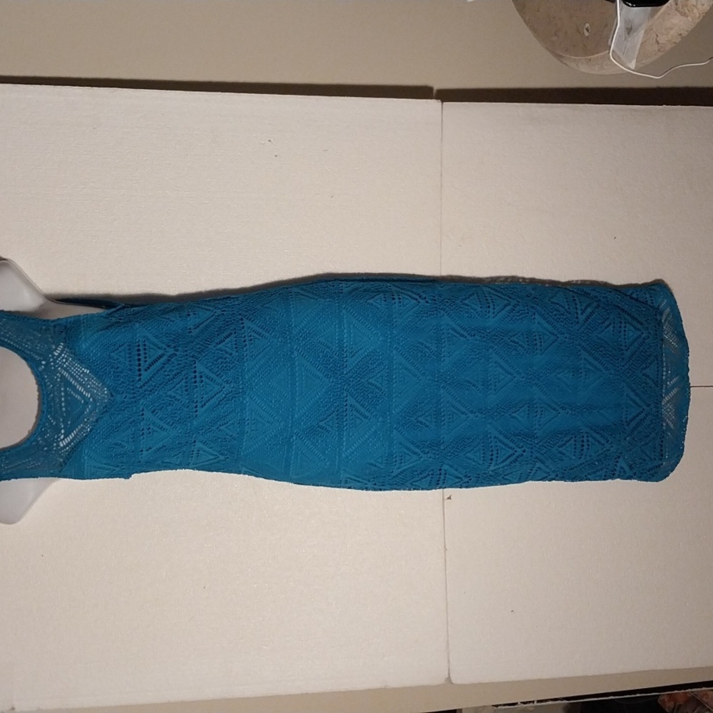 Body Central Body Con Dress. The size says Medium but more like XS.  Very Sexy.